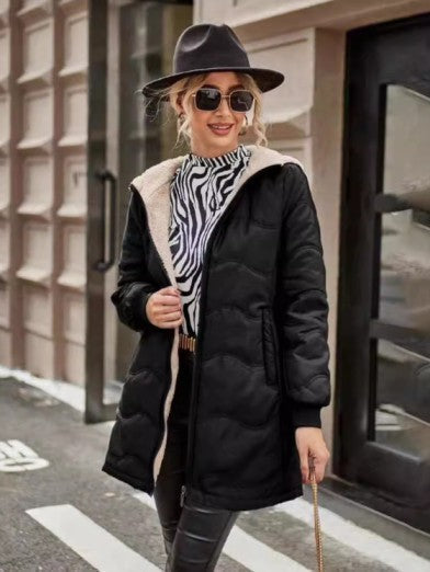 Stylish women's long fleece lined winter coat. Slim fit hooded jacket, perfect for warmth & chic everyday wear.