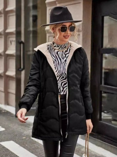 Chic women's long hooded jacket with warm fleece lining. Slim fit design, ideal for trendy winter casual outerwear.