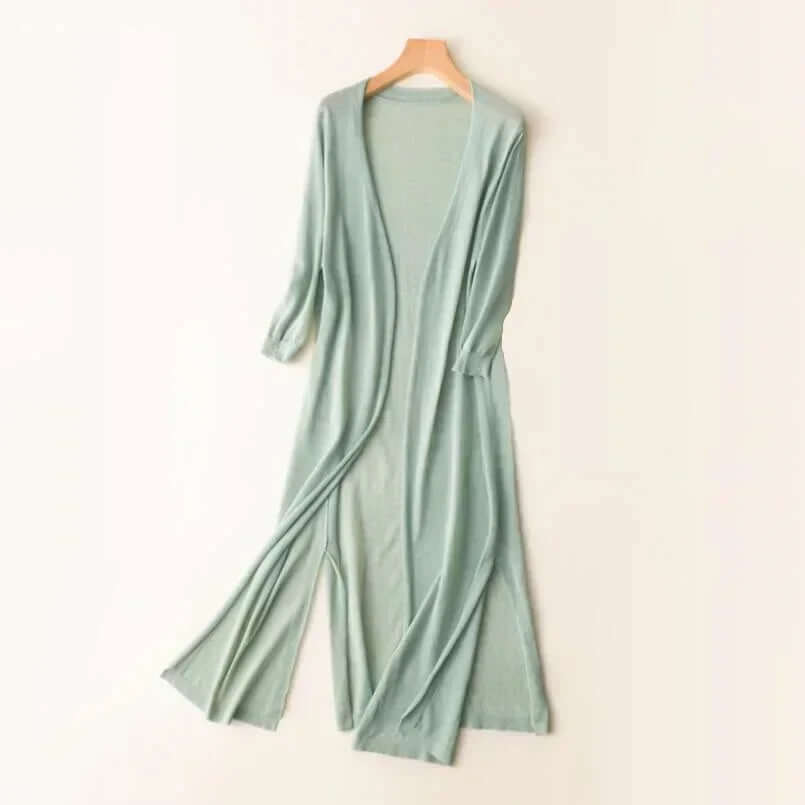 Cozy women's long knit cardigan sweater, ideal for comfortable fall fashion and everyday wear.