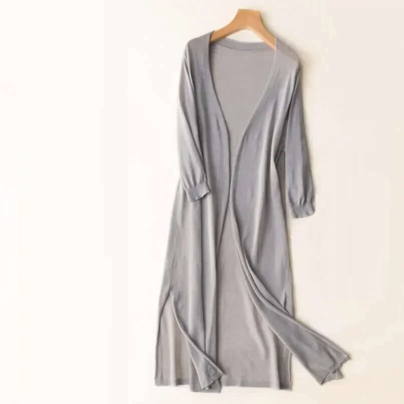 Soft knit women's long cardigan sweater, great for cozy fall casual or elegant outfits.
