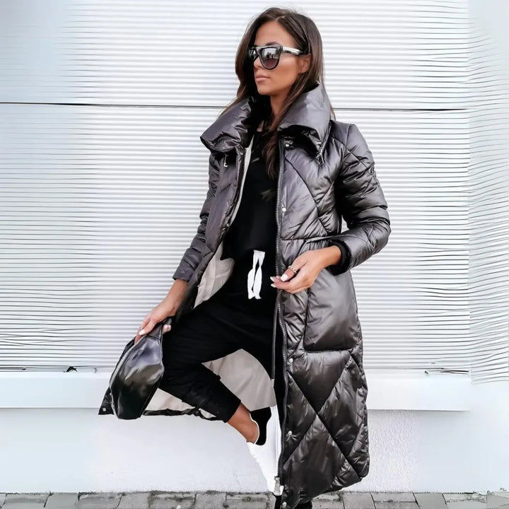 Women's long padded puffer coat with elegant quilted design, perfect for warm winter outerwear.