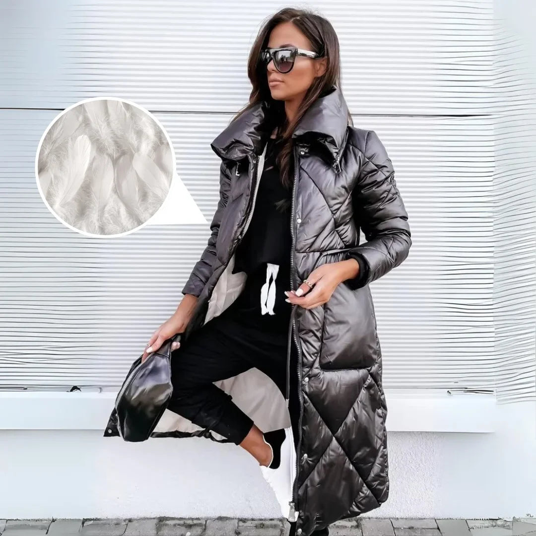 Fashionable women's long puffer coat. Padded & quilted for superior warmth and elegant winter style.