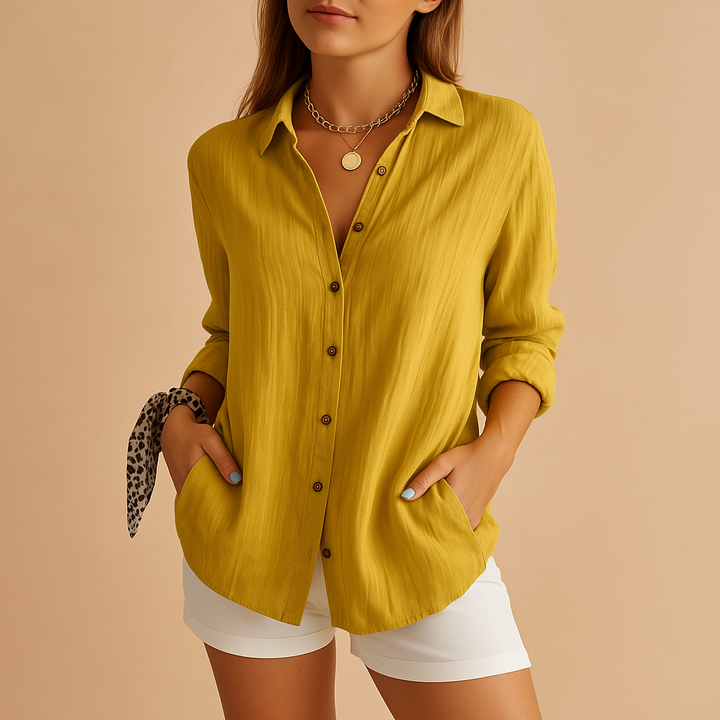 Effortless style with this women's long sleeve button-down blouse. A versatile collared shirt for any occasion.