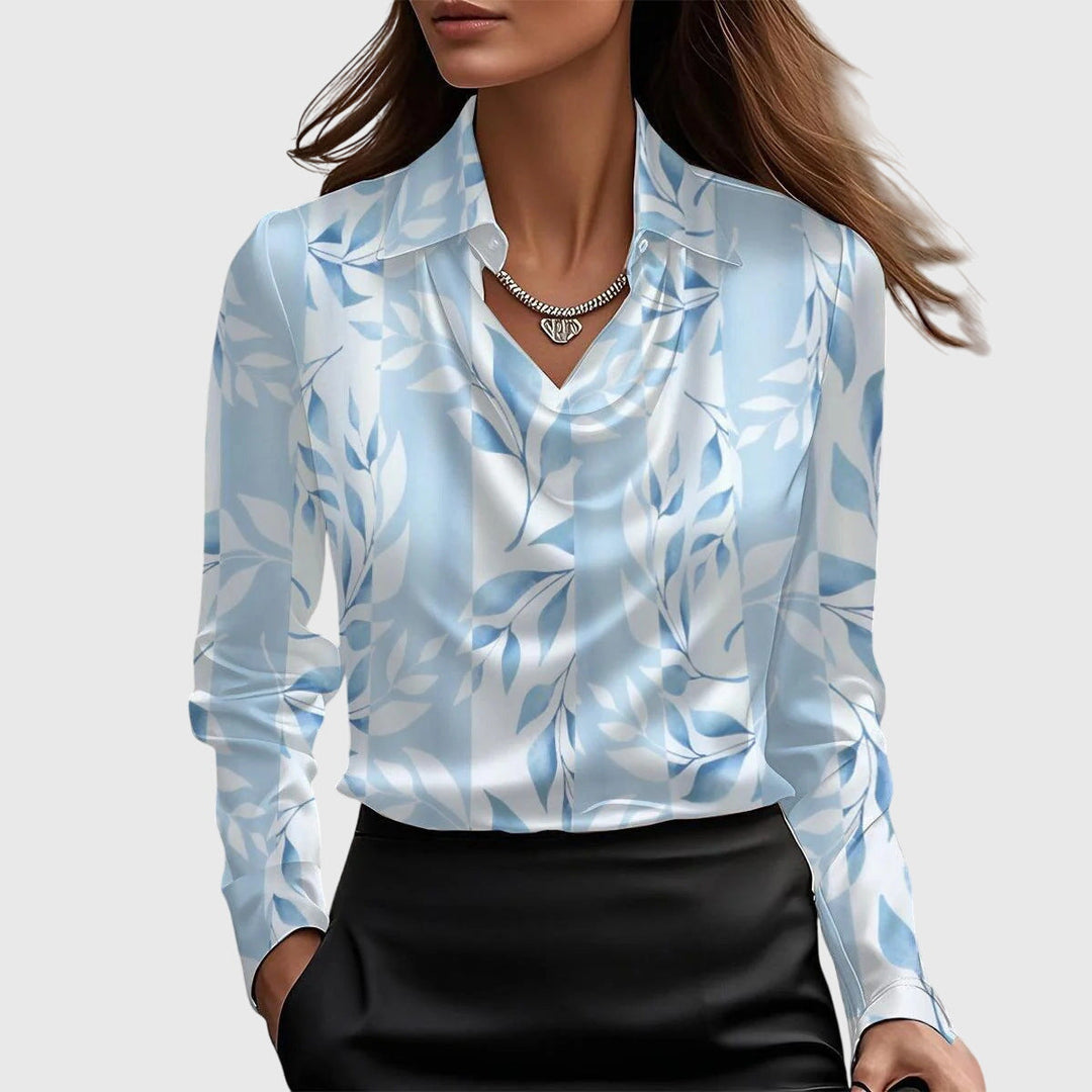 Fashionable women's long sleeve top, featuring a sophisticated collared cowl neck. Classic style.