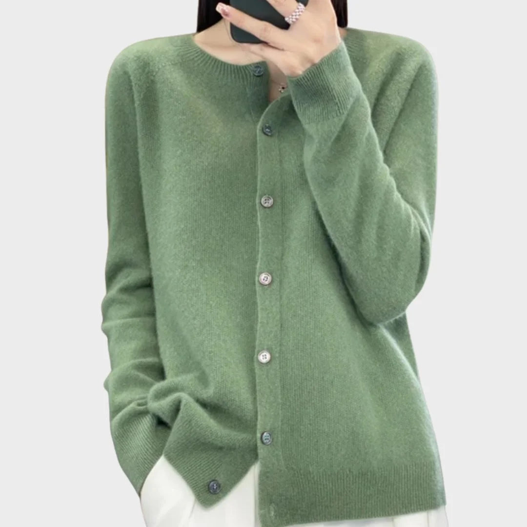 Women's long-sleeve crew neck cardigan sweater with front buttons, ideal for elegant or casual winter outfits.