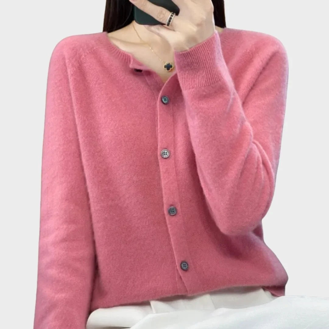 Woman's classic crew neck cardigan with long sleeves & simple button detailing. Essential for any wardrobe.