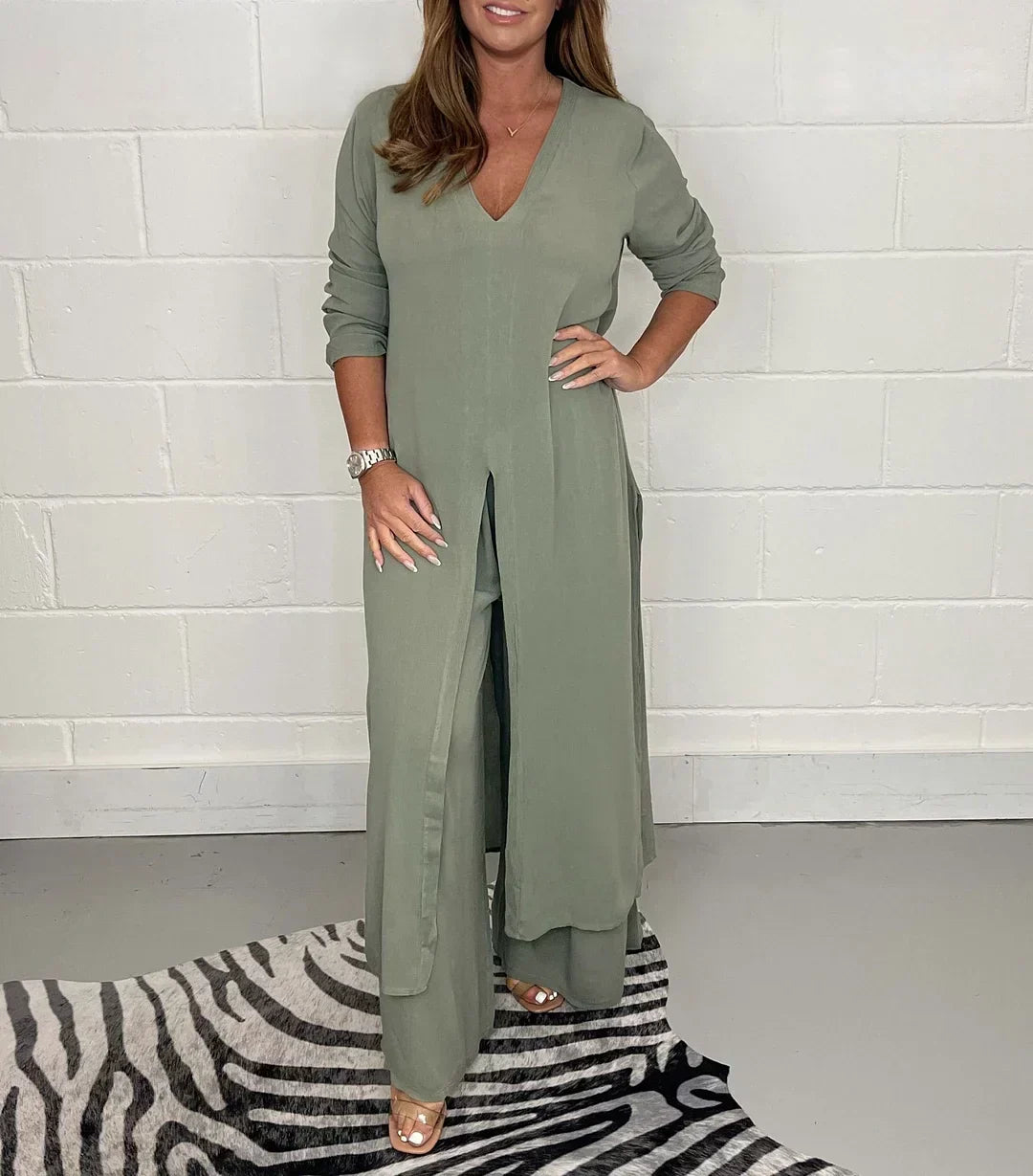 Women's long sleeve v-neck pant set, two-piece casual comfort outfit with relaxed fit.