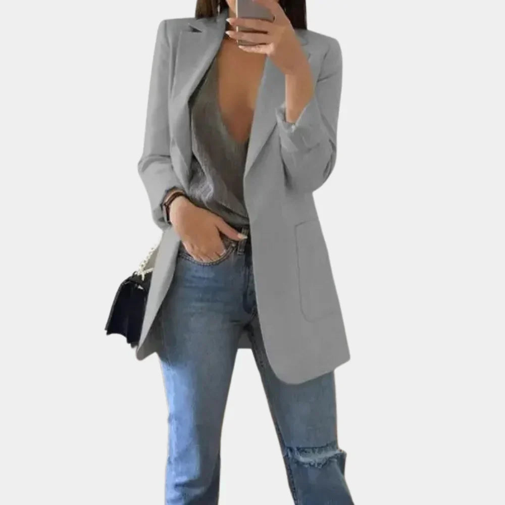 Versatile women's slim fit long blazer, ideal for professional office wear, elegant layering & chic style.