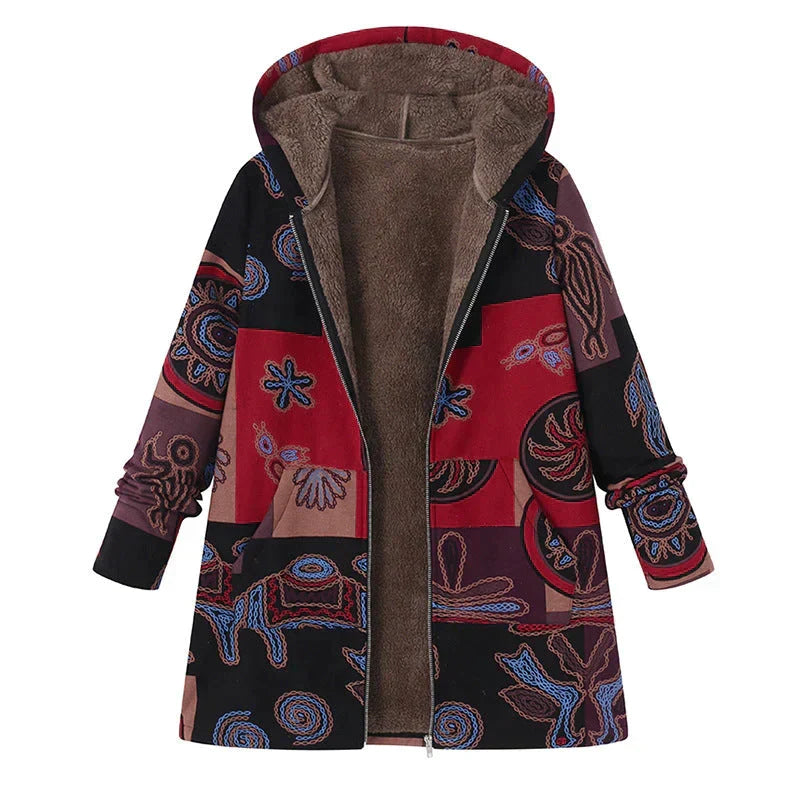 Women's long spring jacket with an adjustable hood & front pockets. Lightweight & fashionable transitional wear.