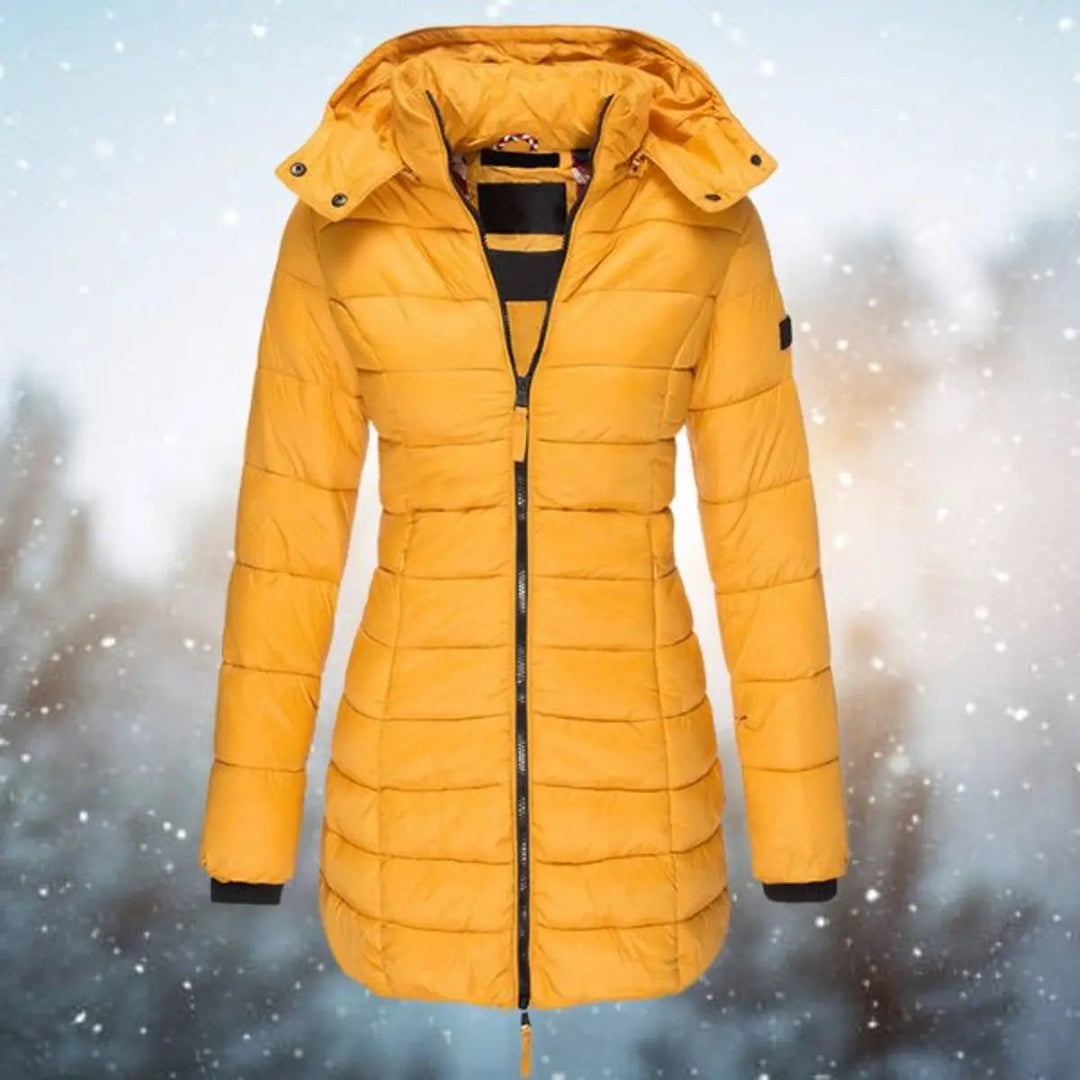 Stylish women's longline puffer coat with a detachable hood, quilted design, perfect warm winter outerwear.