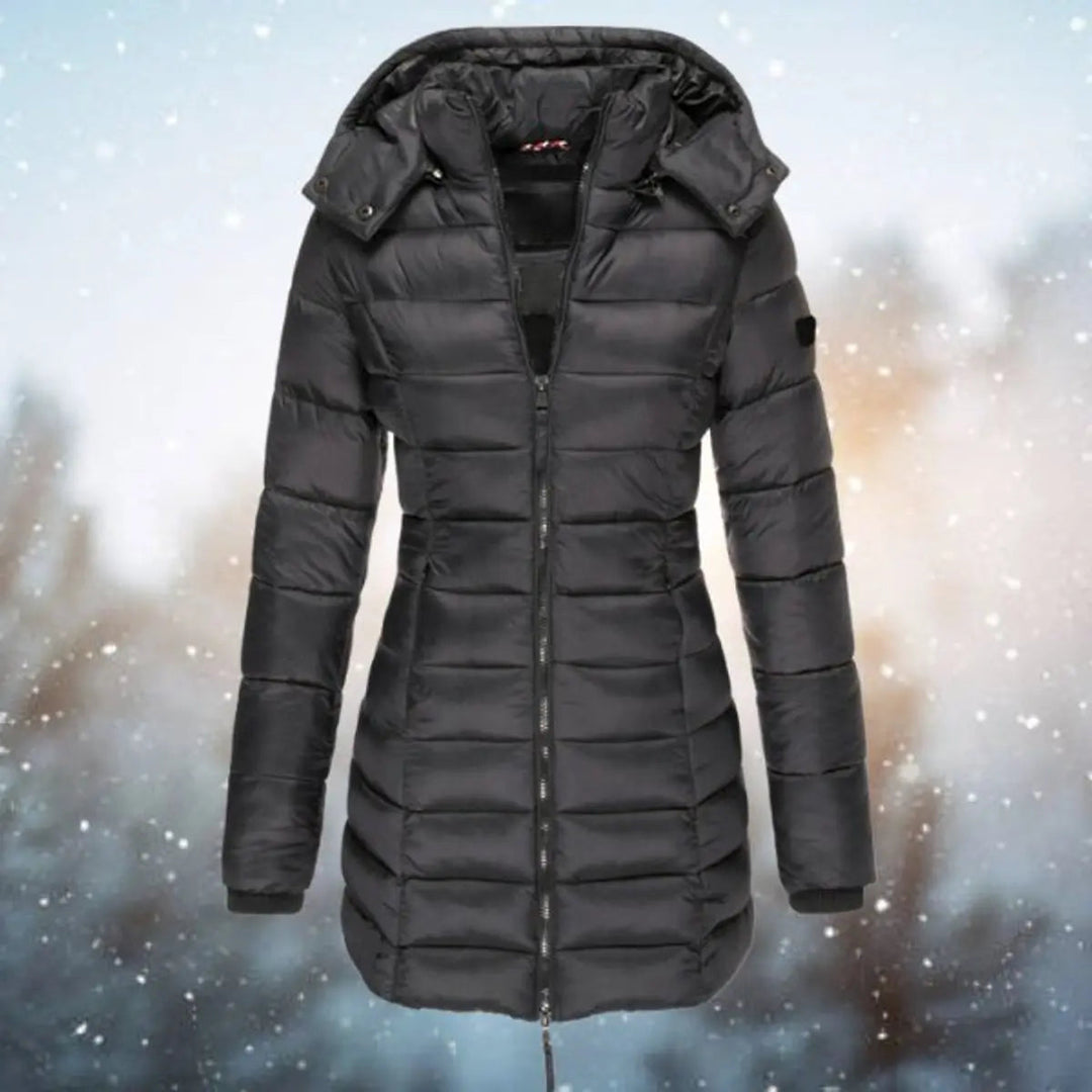 Everyday women's longline hooded puffer coat, a versatile quilted winter jacket for casual cold weather style.