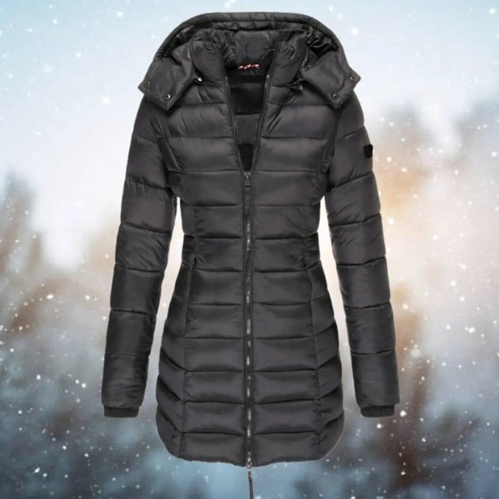 Everyday women's longline hooded puffer coat, a versatile quilted winter jacket for casual cold weather style.