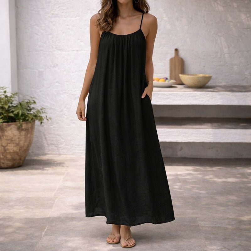 Stylish casual maxi dress for women with spaghetti straps, gathered bust, & a breezy flowy silhouette.