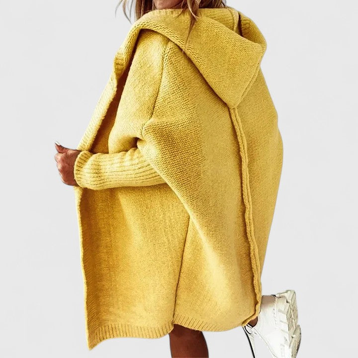 Oversized women's hooded cardigan with a loose fit, ideal comfortable outerwear for a stylish casual look.