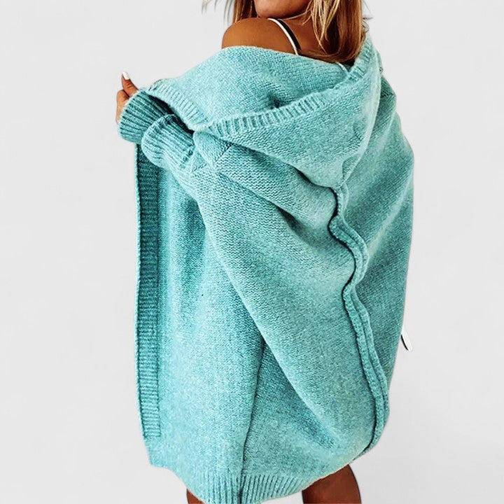 Comfortable women's loose fit hooded cardigan, a versatile layering piece perfect for fall and winter style.