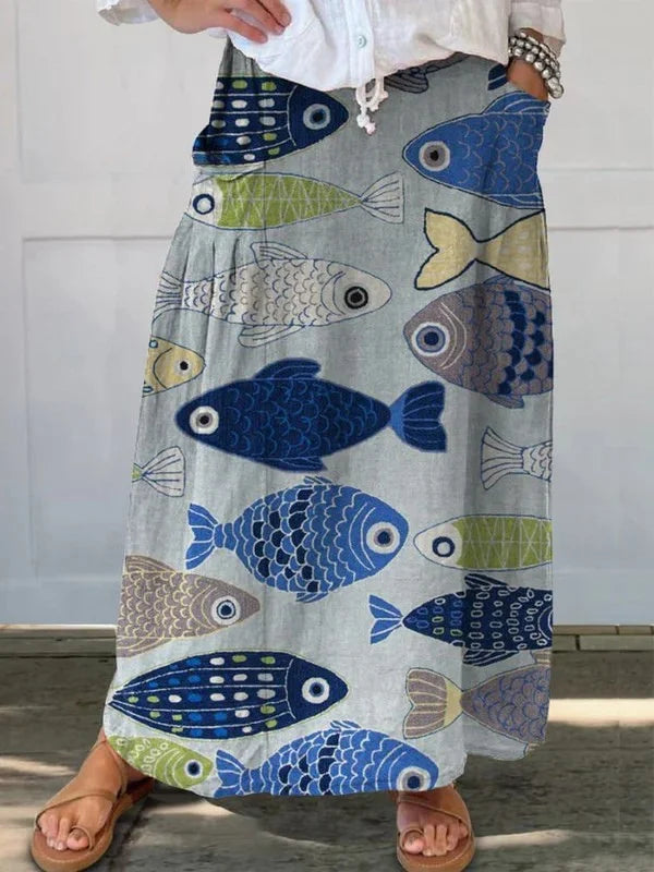 Women's loose fit maxi skirt with fish print, drawstring waist, & pockets. Perfect for vintage casual summer fashion.