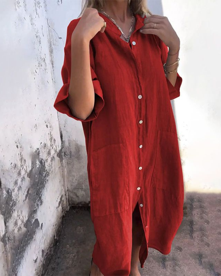 Lightweight women's midi shirt dress, perfect for summer style. Features a breathable loose fit, button front, and pockets.
