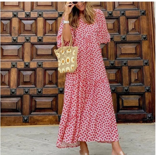 Comfortable women's ruffled dress in a loose fit, featuring a stylish print and knee-length design for daily wear.