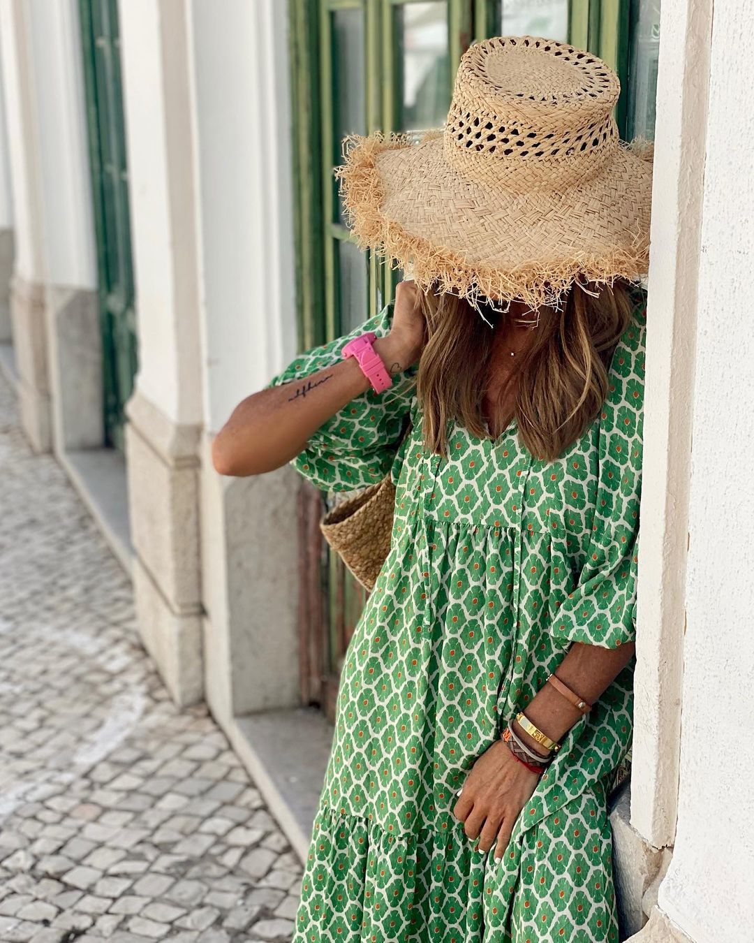 Women's knee-length printed dress with three-quarter sleeves, loose fit, and lovely ruffles for autumn comfort.