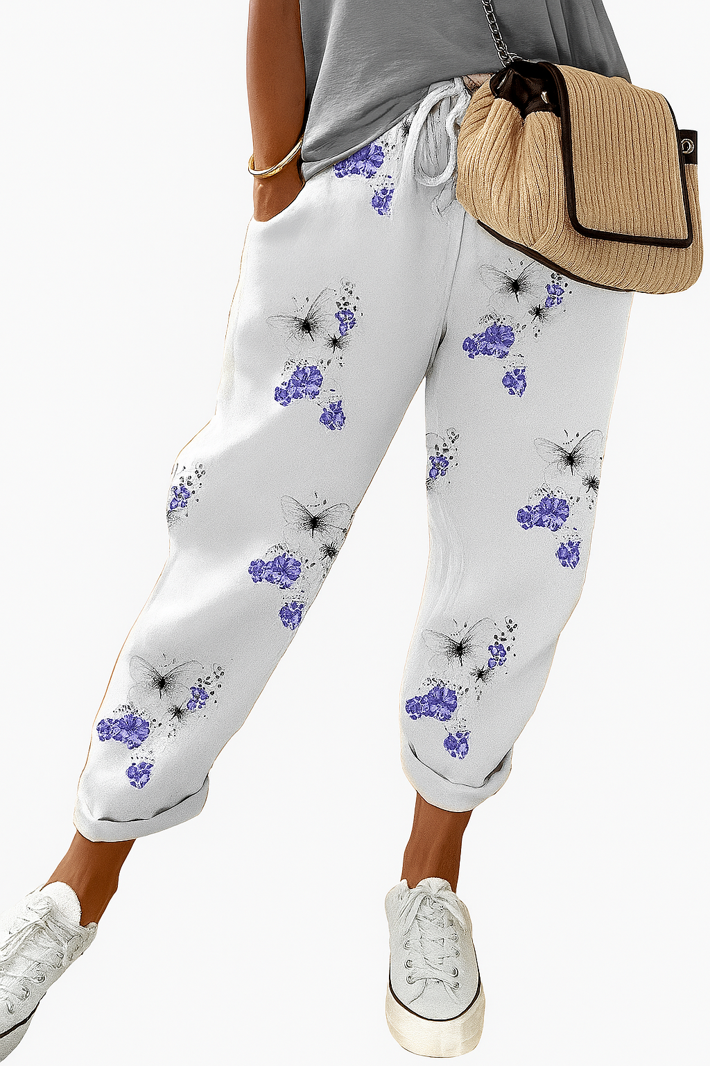 Women's loose fit printed summer trousers with elastic waist, perfect for casual comfort or beach wear.