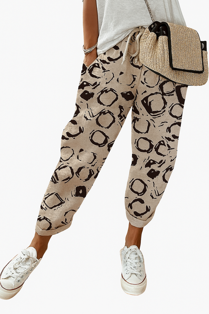 Stylish patterned women's summer pants, loose and comfy with an elastic waist, ideal for vacation outfits.