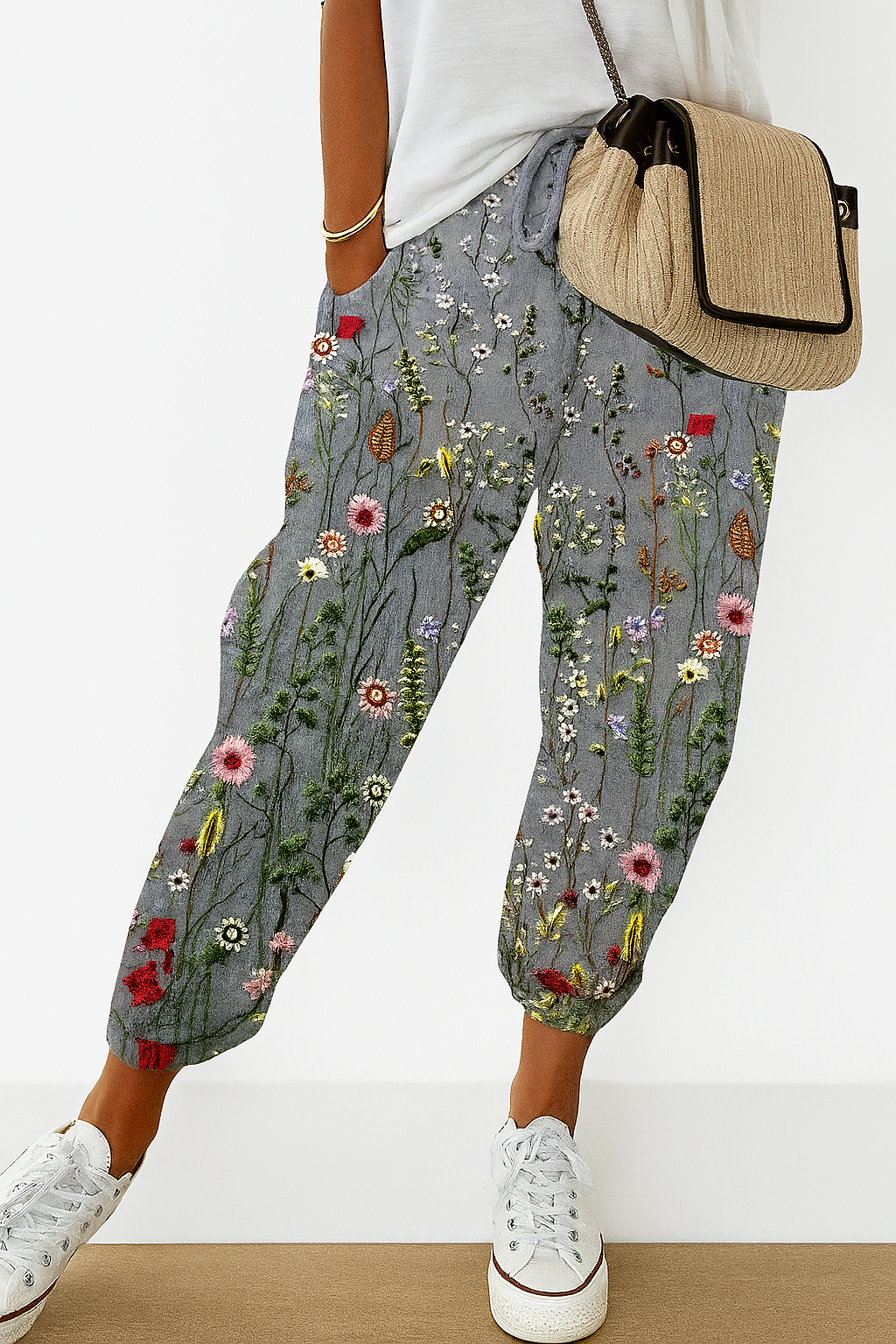 Plus size women's comfy printed trousers featuring an elastic waist & loose flowy design. Great for summer fashion.