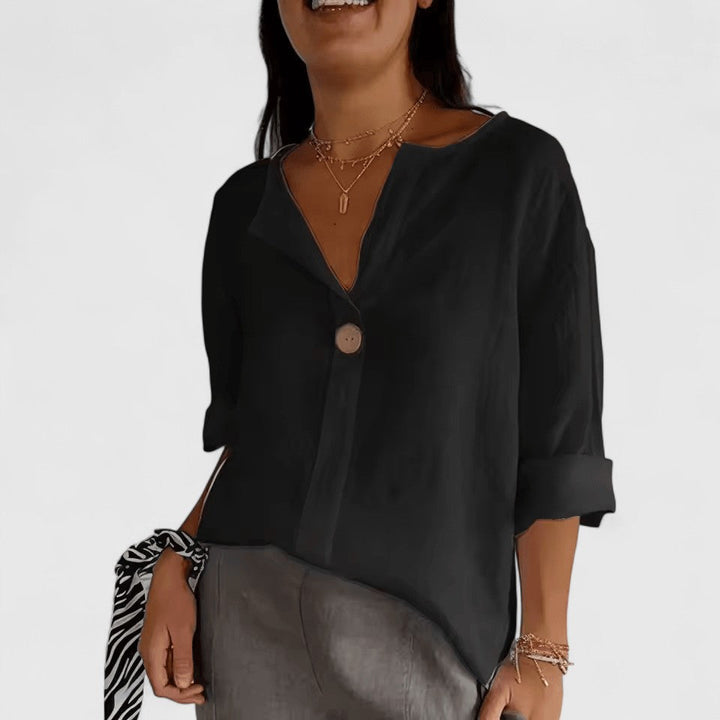 Women's loose-fit V-neck blouse with chic front knot detail. Perfect for casual elegant summer fashion.