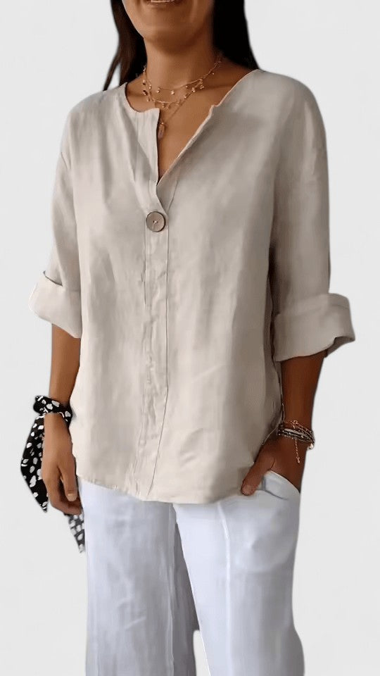 Stylish women's V-neck top with a flattering loose fit & front knot. Perfect for summer casual elegance.