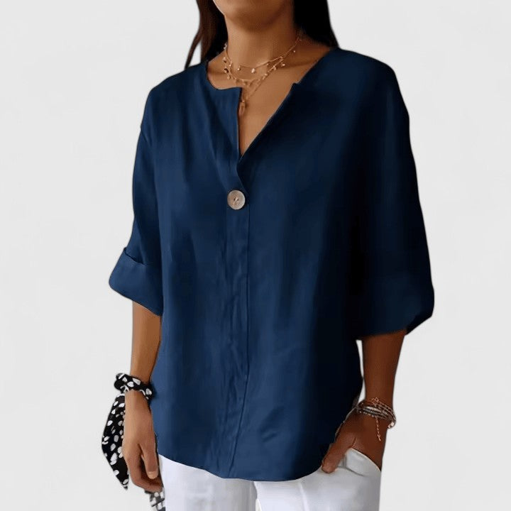 Lightweight women's V-neck blouse, loose-fit with front knot detail. Great for summer fashion & everyday wear.