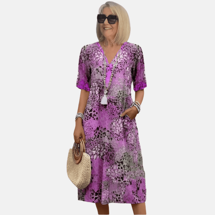 Retro style women's loose fit summer dress with striking 3D print. V-neck, short sleeve, a chic patterned casual sundress.