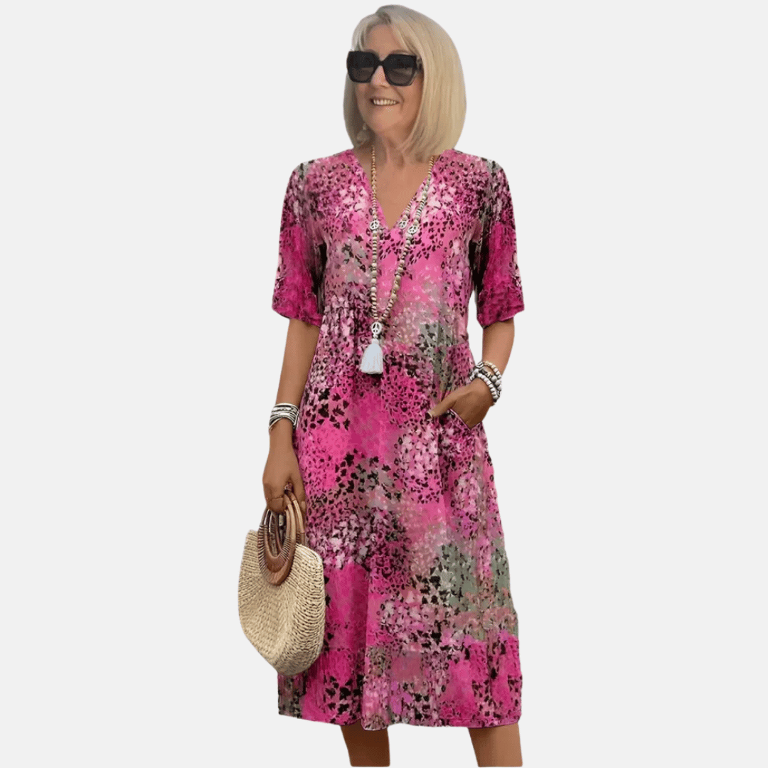Fashionable women's V-neck 3D print summer dress. Loose fit, knee length & short sleeve, a versatile casual or vacation sundress.