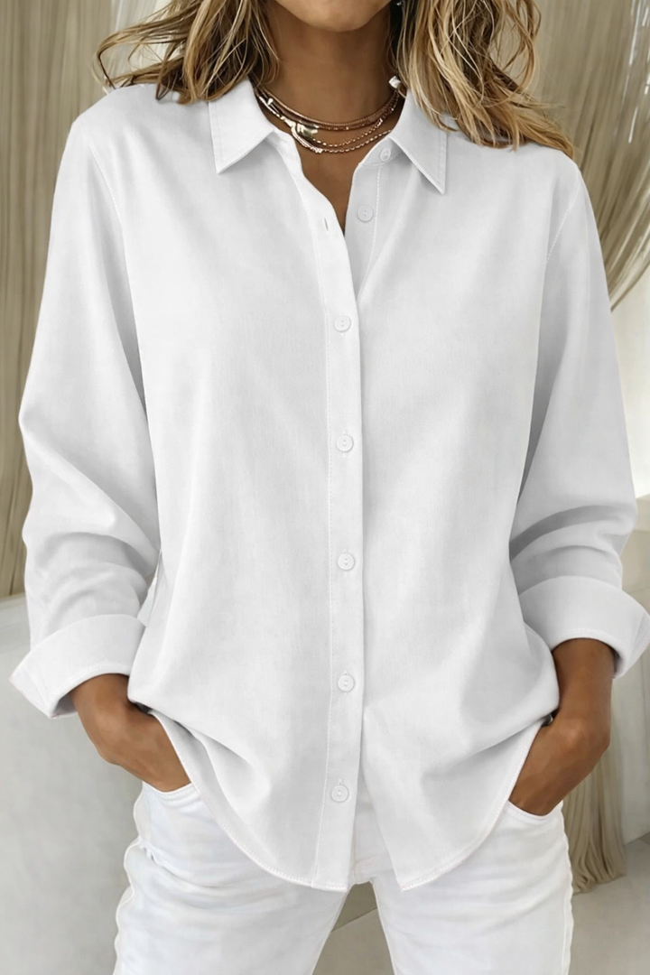 Versatile women's button-down blouse with a loose fit, ideal as a casual summer top for any occasion.