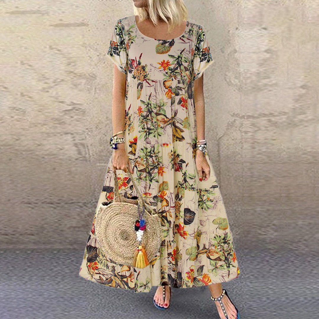 Women's loose floral print maxi dress with short sleeves, perfect for casual summer wear & effortless style.