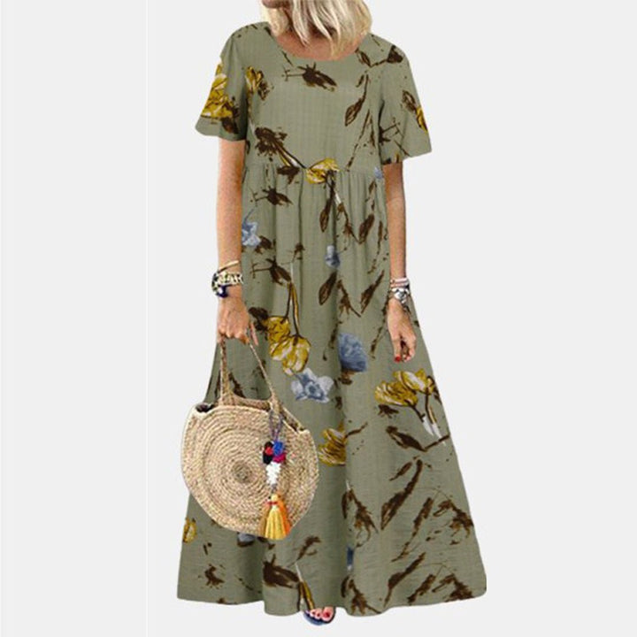 Vibrant floral print women's maxi dress, loose and flowy, perfect casual short sleeve summer outfit.