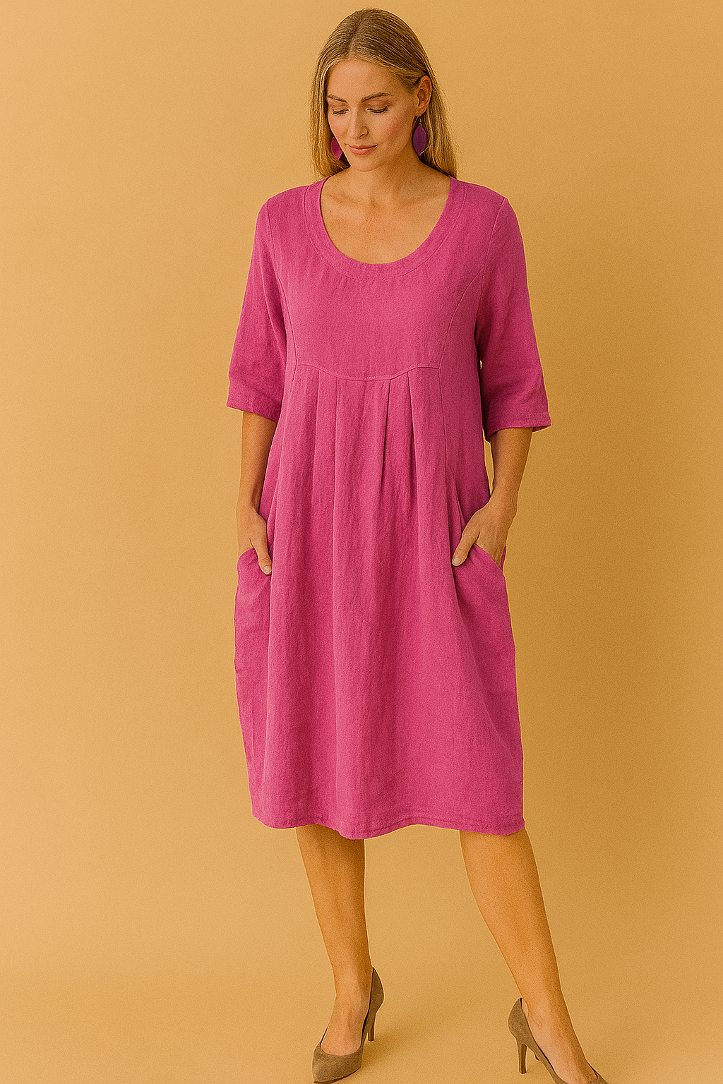 Feminine short sleeve loose dress with a round neckline and useful side pockets, offering comfort and style for women.