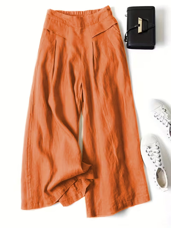 Women's loose wide-leg trousers for effortless comfort. Casual flowy pants with an elastic waist.