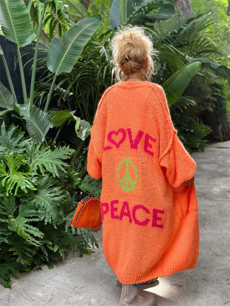Women's Love & Peace graphic cardigan, open front, long sleeve, perfect cozy and chic layering piece for casual wear.