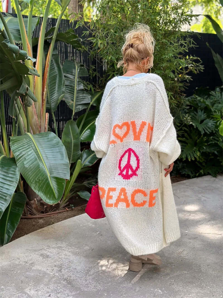 Stylish women's Love & Peace graphic cardigan. Cozy open-front sweater, ideal for fall fashion or spring outfit layering.
