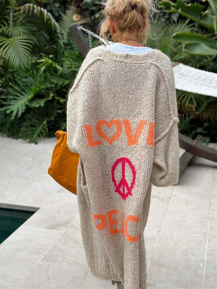 Cozy women's Love & Peace cardigan with graphic design. A stylish, open-front sweater for casual wear and positive vibes.
