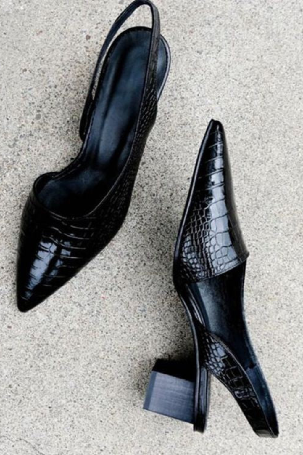 Brown low heel slingback pumps for women. Stylish pointed toe heels, ideal for sophisticated workwear.