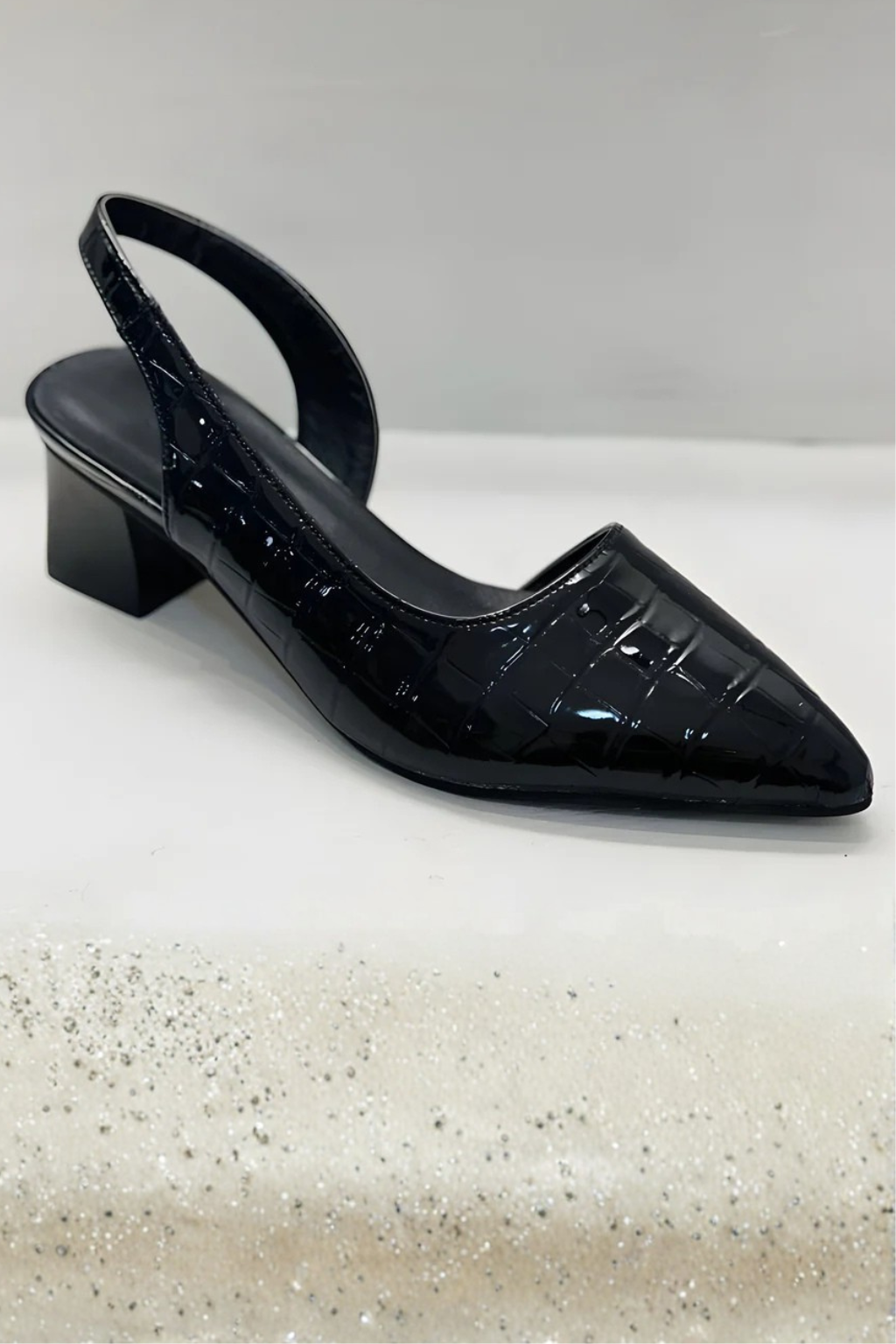 Women's elegant low heel slingback pumps. Pointed toe design makes them comfortable and chic for any outfit.