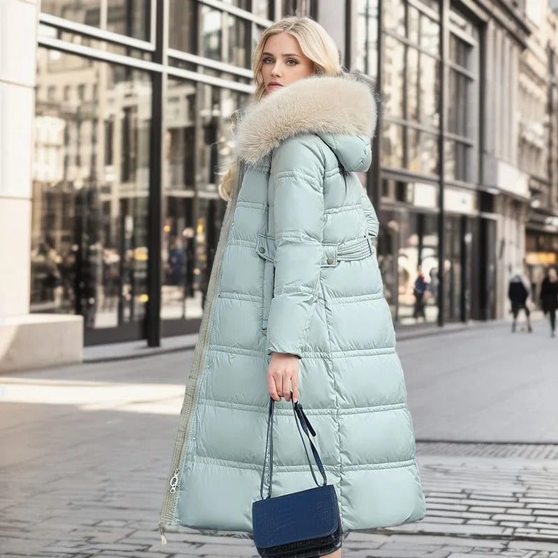 Warm Lucia women's designer parka, long winter jacket with luxurious faux fur hood.