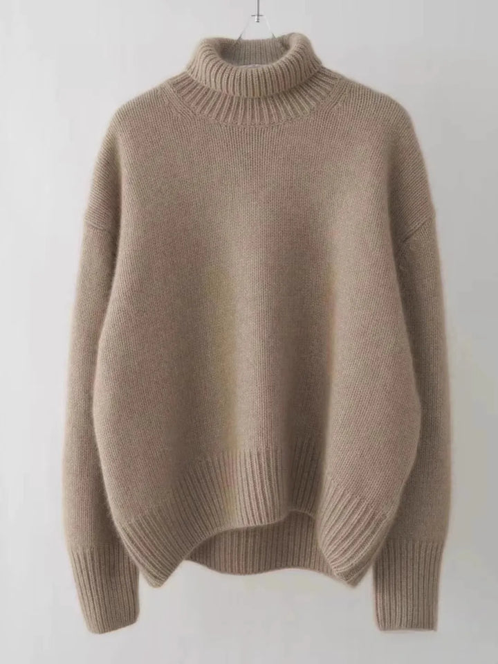 Versatile women's luxe turtleneck sweater, a comfortable long-sleeve top for classic fall and winter apparel.