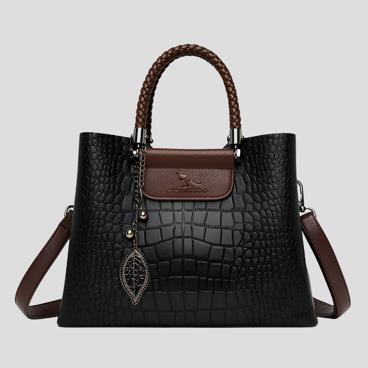 Spacious beige leather shoulder bag. Women's stylish fashion handbag, ideal for daily essentials & versatile use.