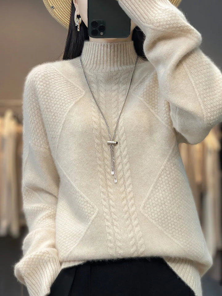 Women's luxurious cashmere roll neck jumper with elegant cable knit pattern for ultimate winter warmth.