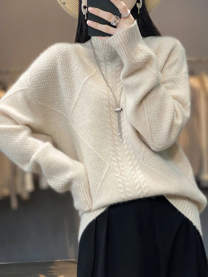 Cozy women's cable knit cashmere sweater. Soft roll neck jumper, perfect for elegant winter fashion.