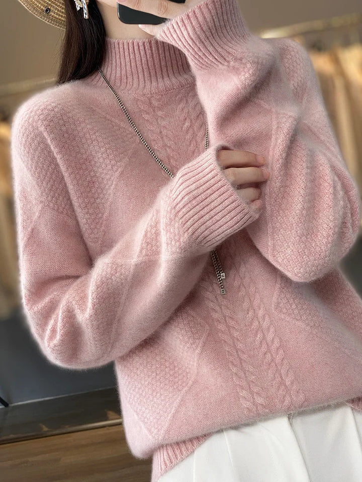 Warm women's cashmere roll neck, featuring a classic cable knit design for luxurious comfort.