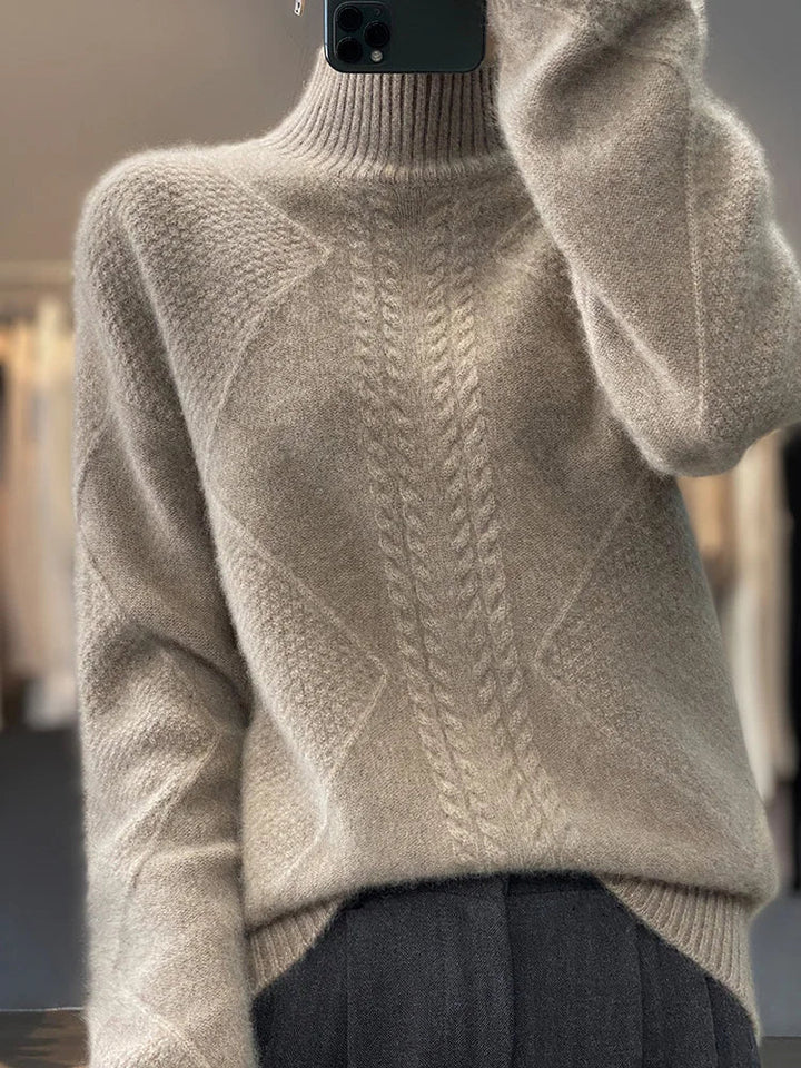 Elegant women's long sleeve cashmere sweater with a warm roll neck and sophisticated cable knit.