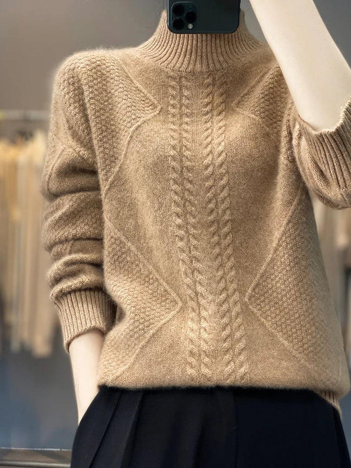 Cozy women's cashmere roll neck. A warm, soft cable knit jumper, ideal for winter style and comfort.