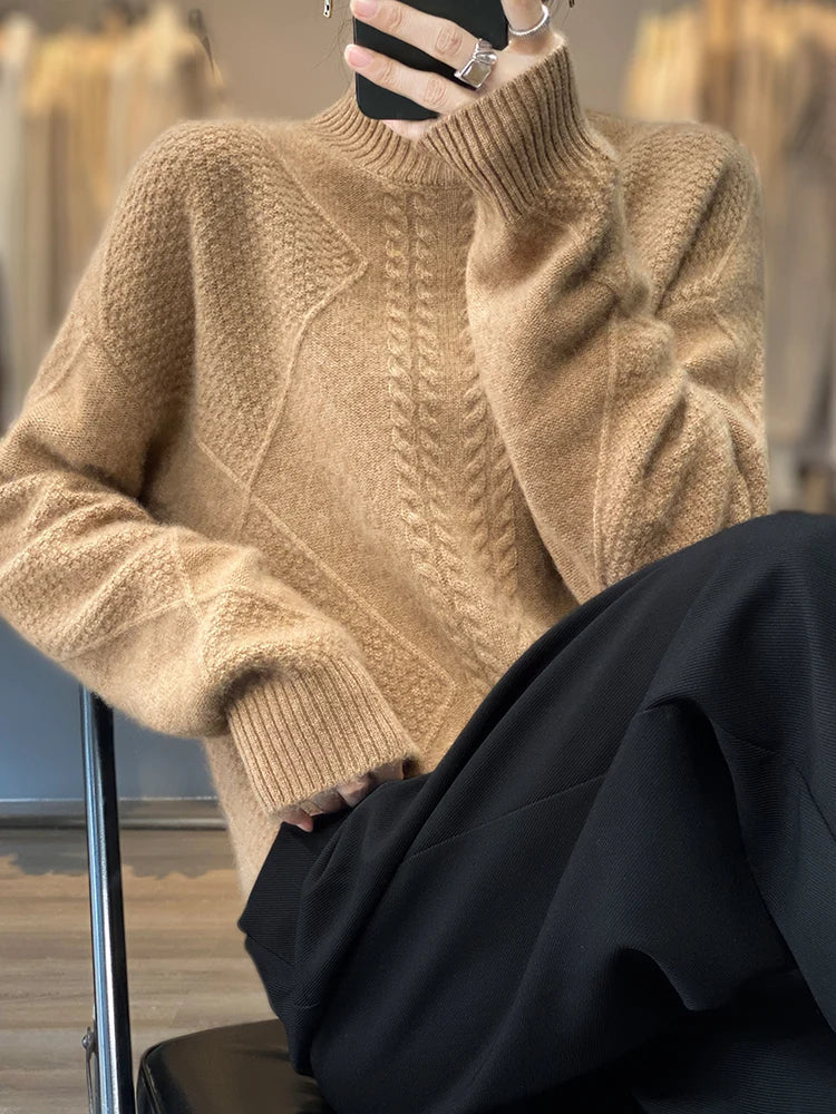 Premium women's cashmere roll neck sweater with an intricate cable knit, providing soft, elegant warmth.